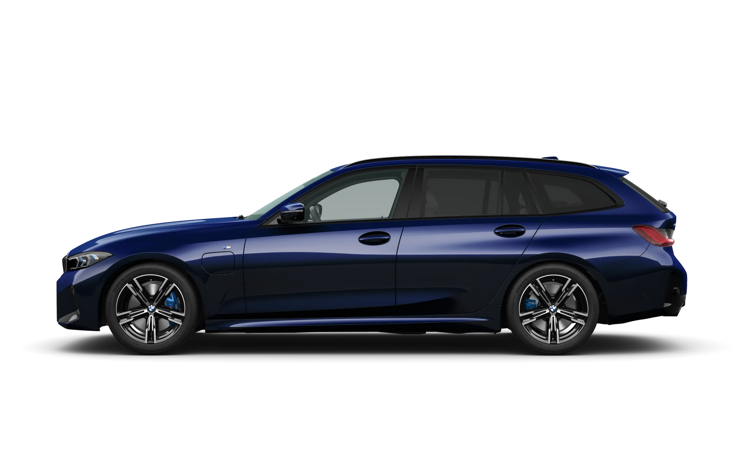 Donkerblauwe BMW 318i Touring waarmee we naar Zwitserland rijden